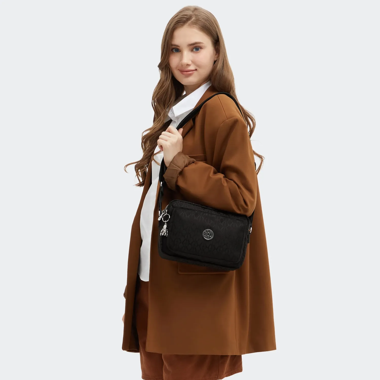 Kipling Abanu M crossbody tas Medium Noir Sign Jq ritsvakken