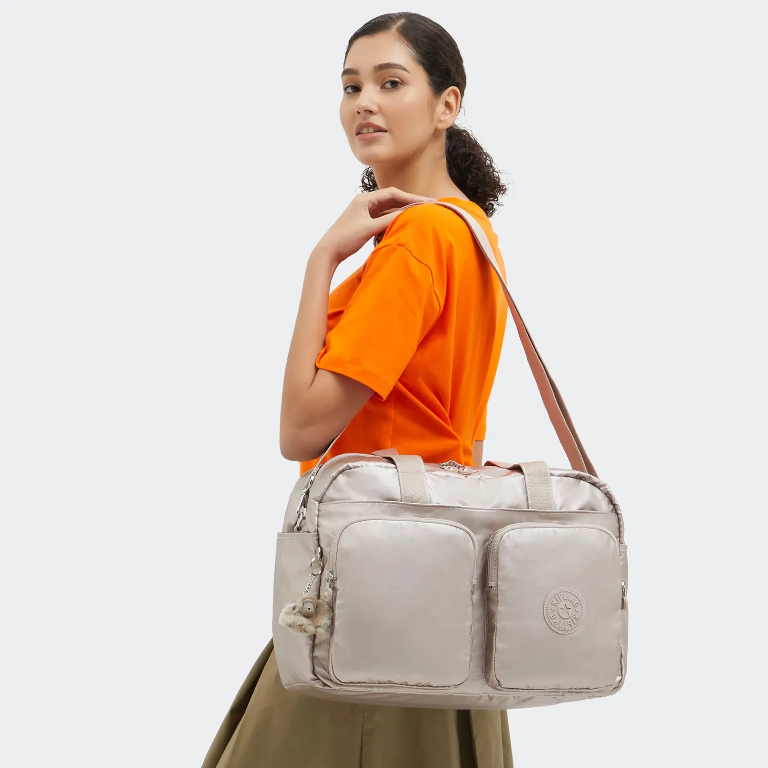 Kipling Defea XL weekendtas Medium Metallic Glow met laptopvak