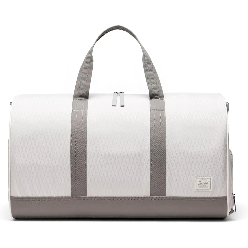Herschel Novel duffel Woodland Camo canvas reistas