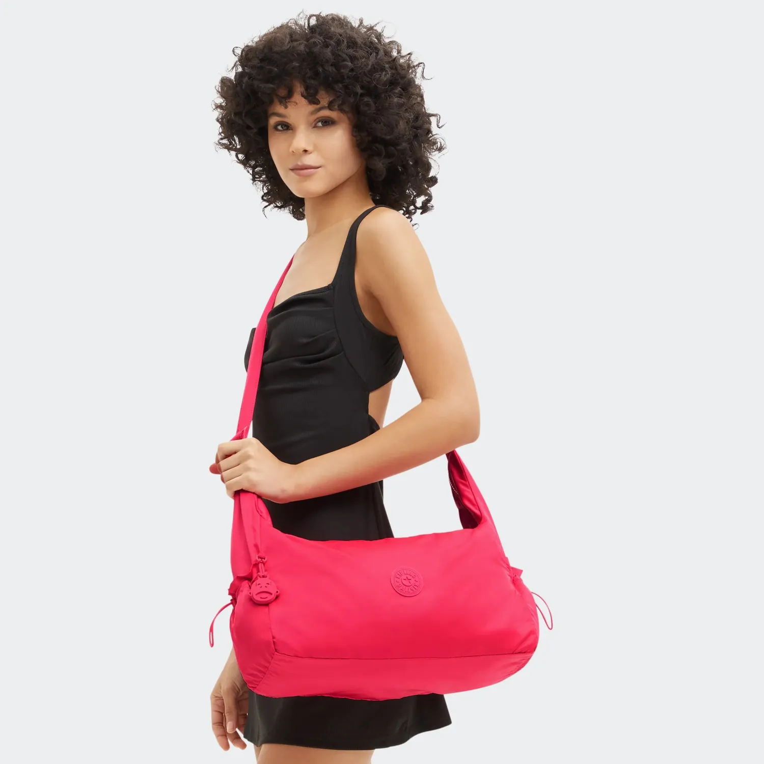 Kipling Gwyn schoudertas groot Simply Fuchsia flessen