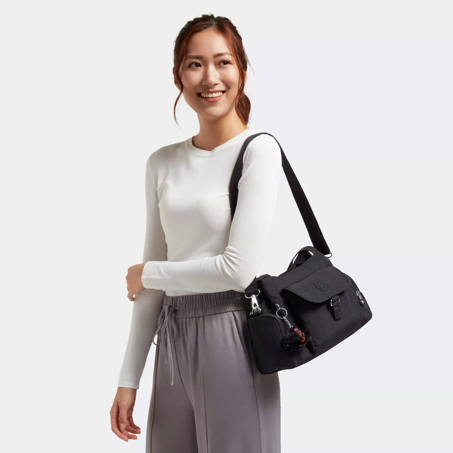 Kipling Felix L U schoudertas Klein Black Tonal ritsvakken