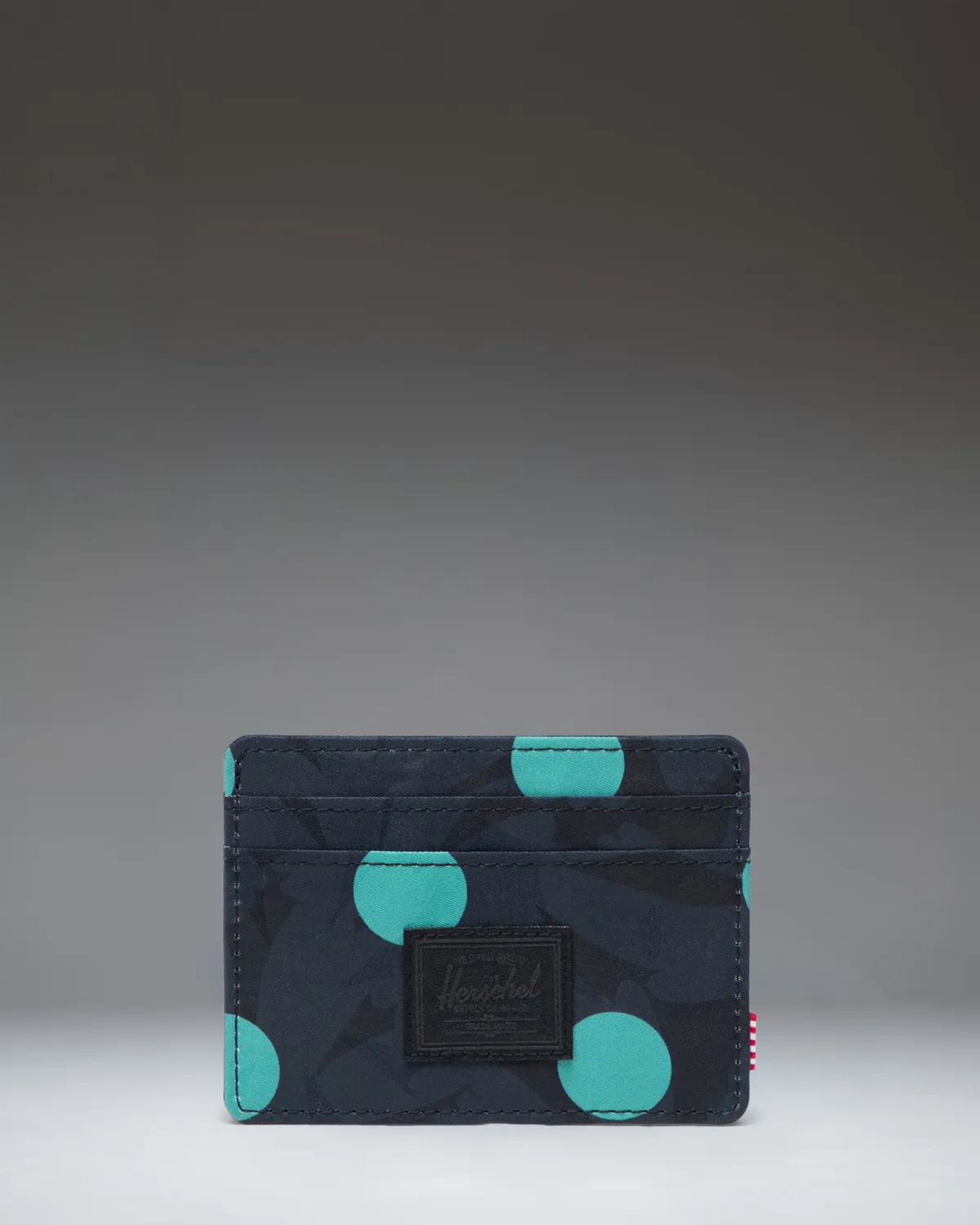 Herschel Charlie kaarthouder polka dot zwart slank