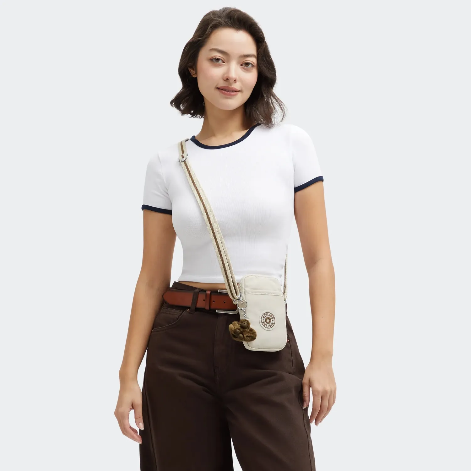 Kipling Tally telefoontas Soft Sand Klein waterafstotend