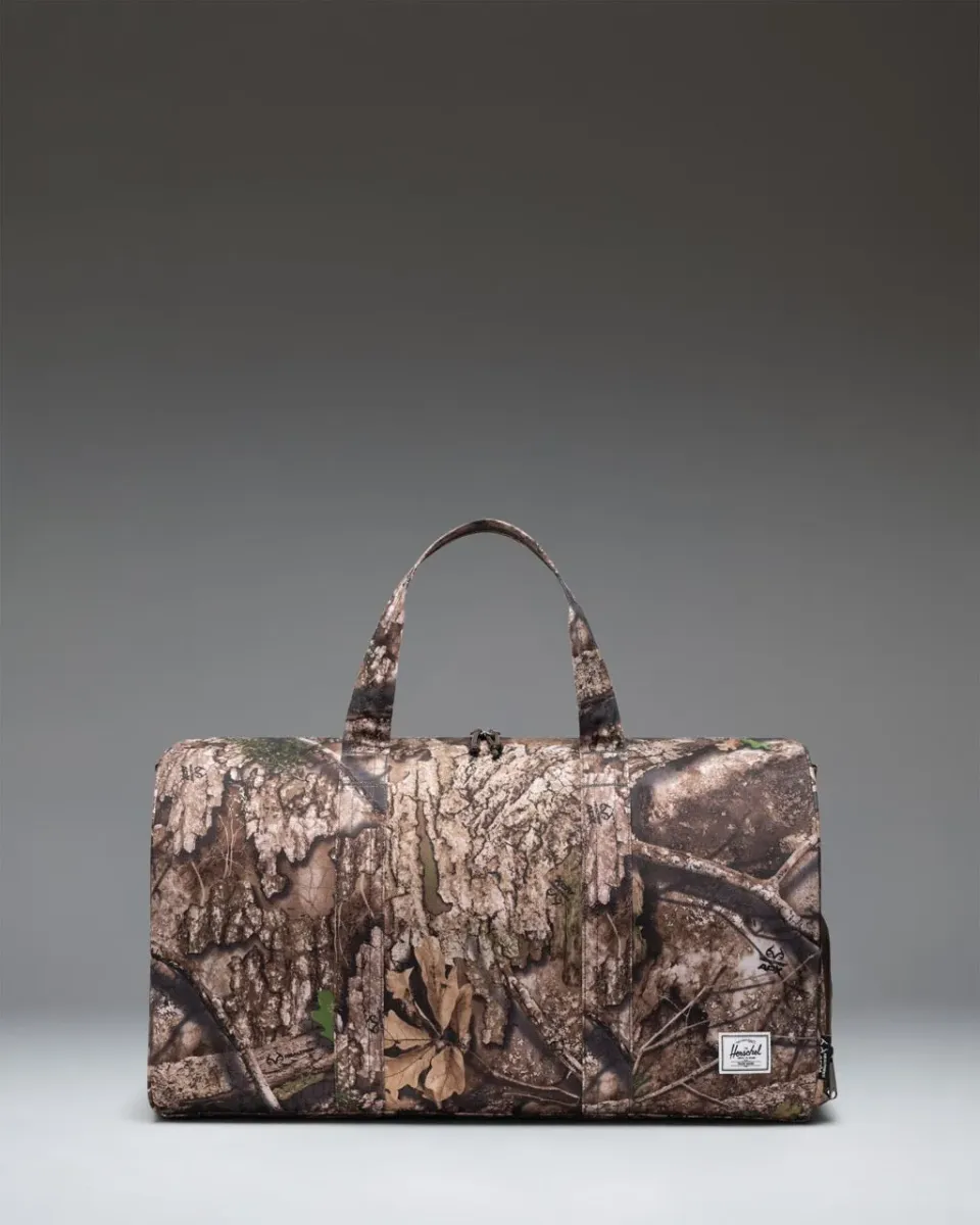 Herschel Novel duffle Realtree APX Camo handbagage