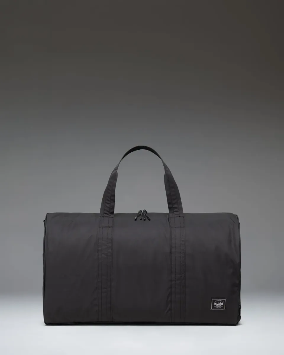 Herschel Novel Duffle Twill reistas zwart grijs