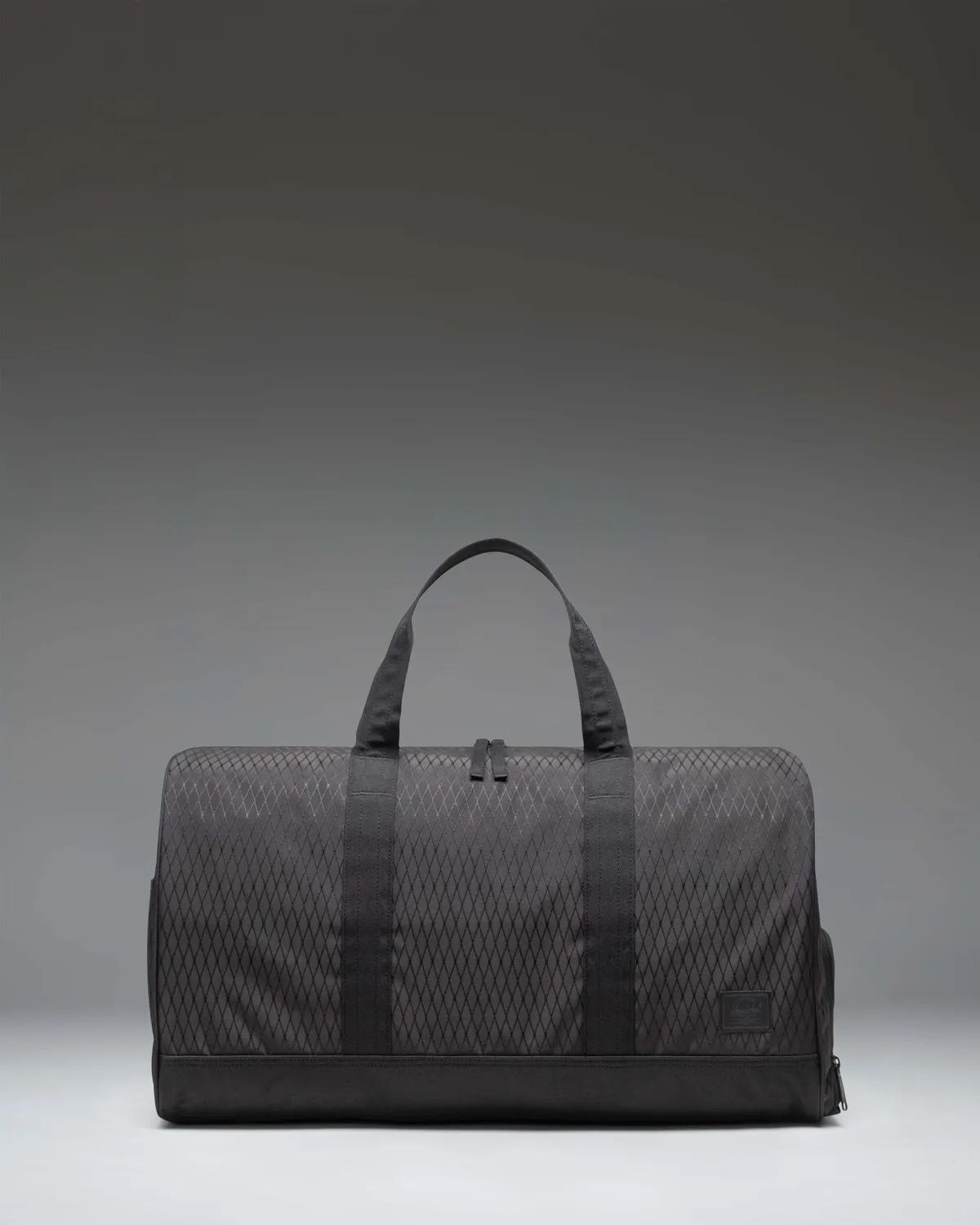 Herschel Novel reistas raven crosshatch handbagage