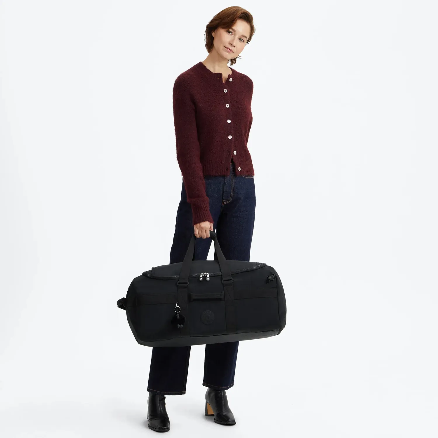 Kipling Donis M reistas Black Noir Medium met laptopvak