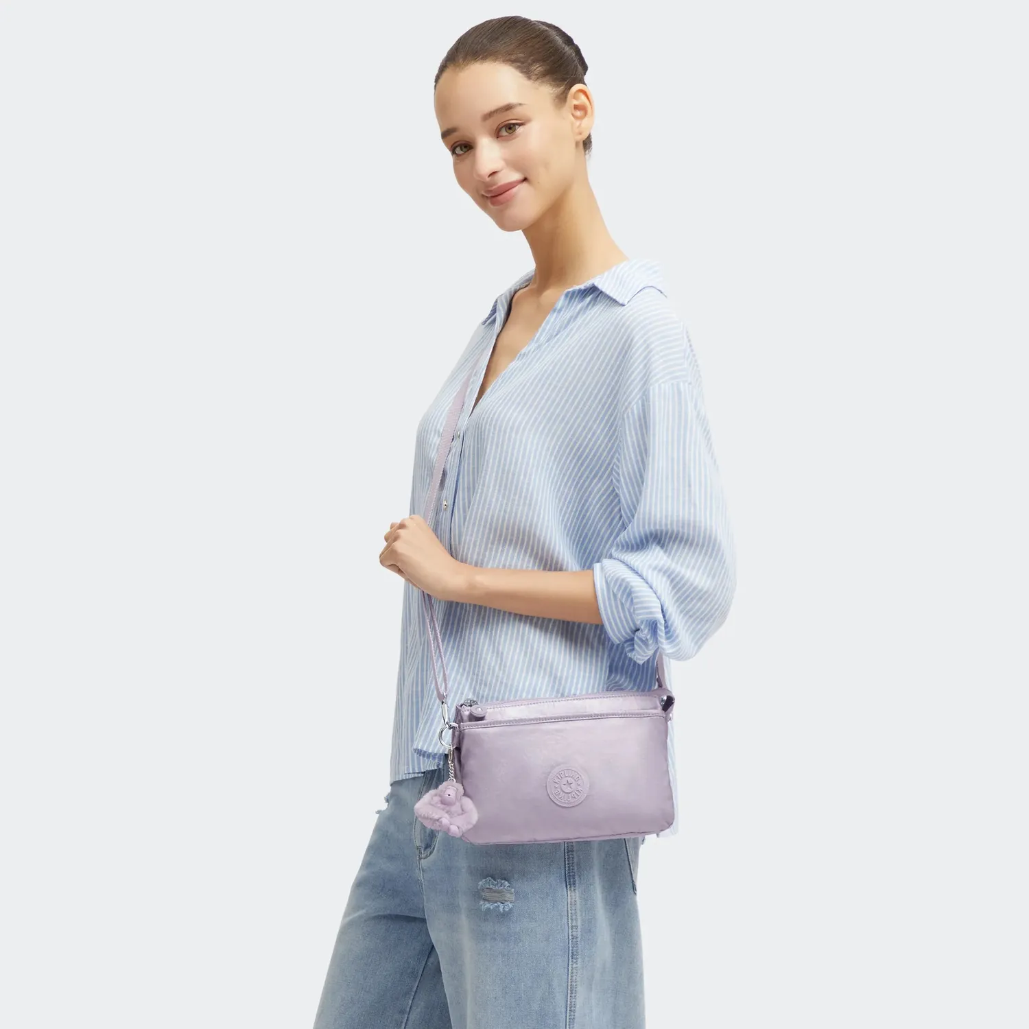 Kipling Riri crossbodytas Klein Lilac Moon Metallic glans