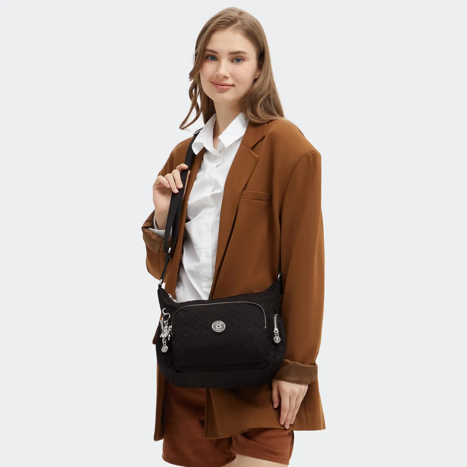 Kipling Gabb S crossbody tas Medium Noir Sign Jq met trekkoordvak