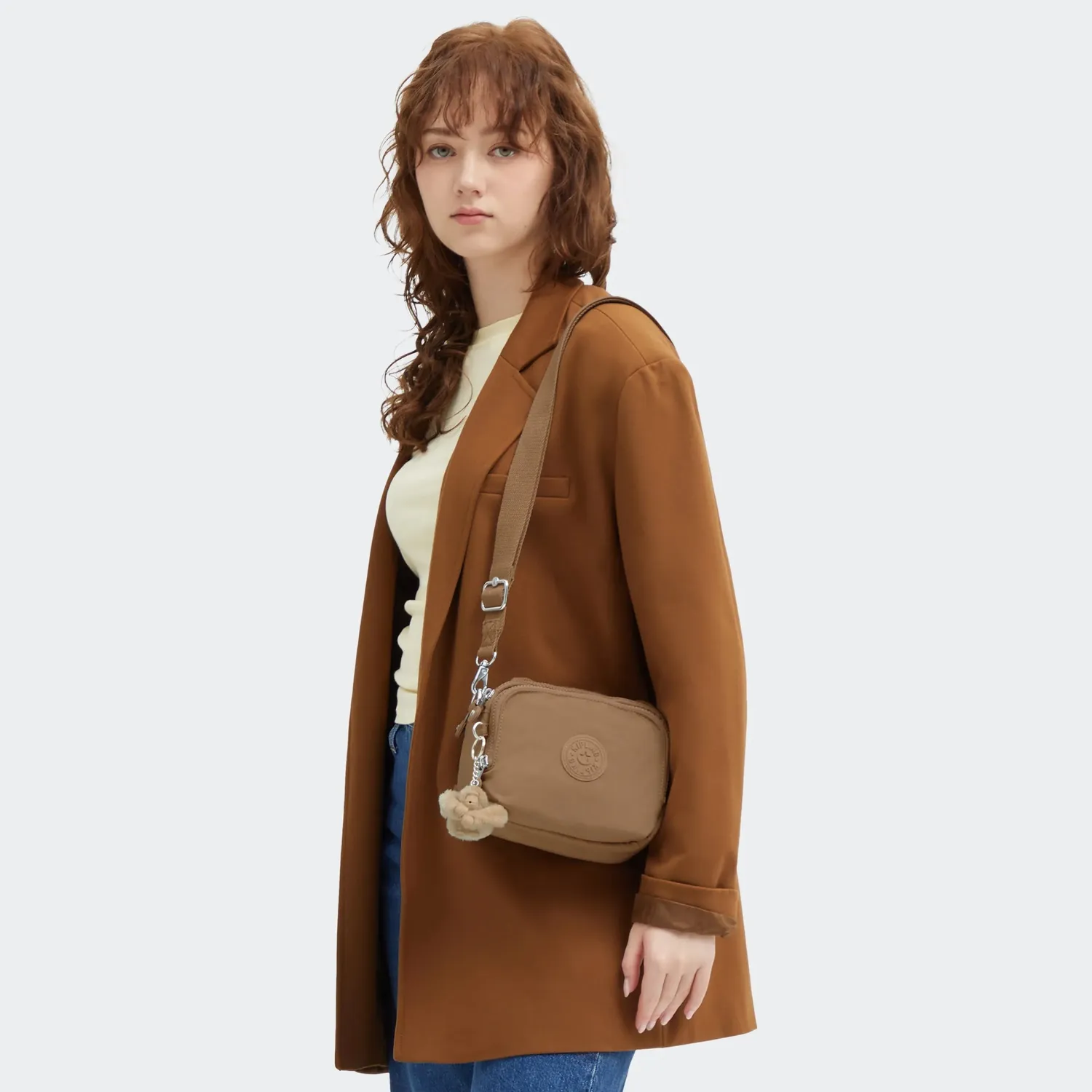 Kipling Cahir crossbody klein Early Tan met voorvak