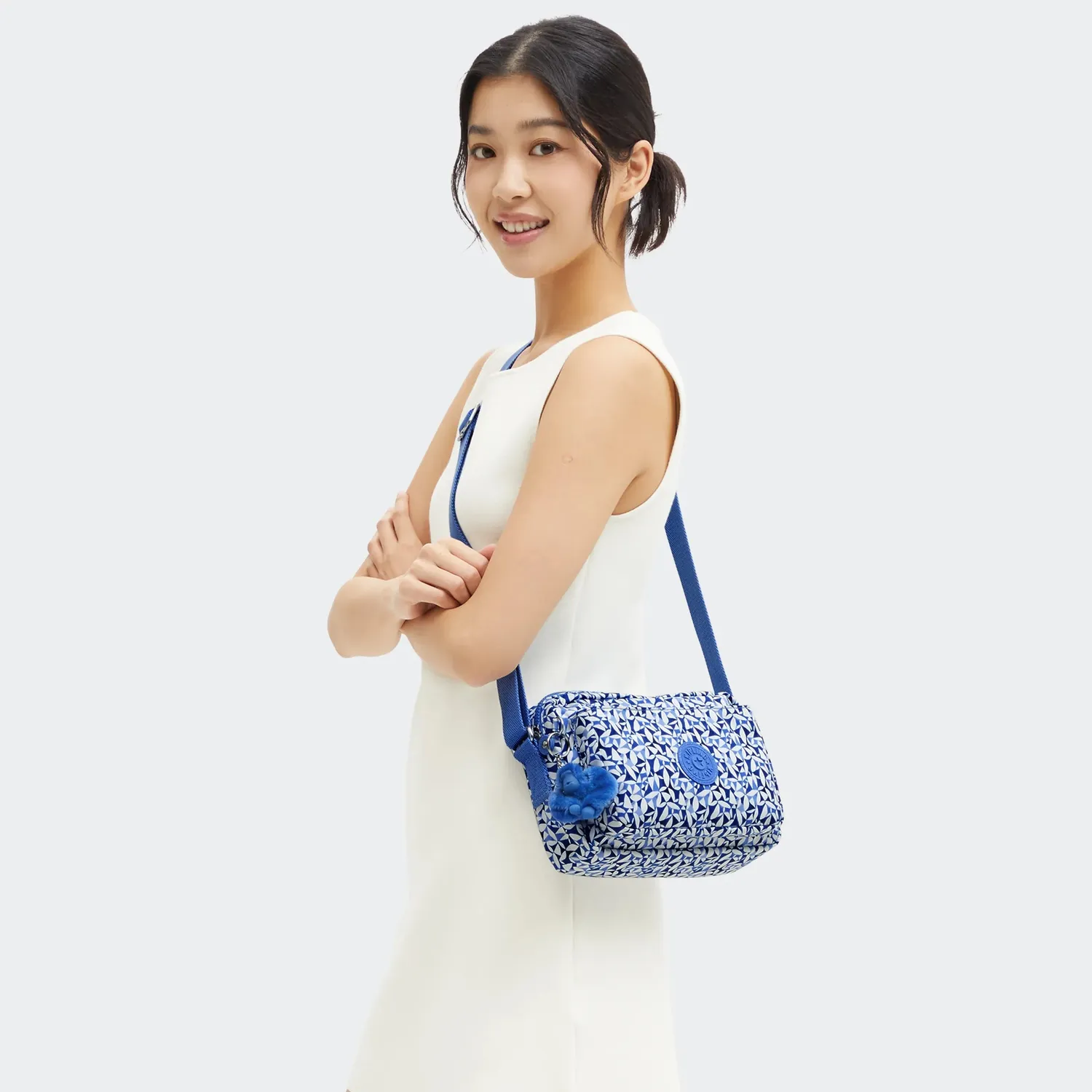 Kipling Abanu M crossbody tas Crazy Leaves medium met ritsvakken