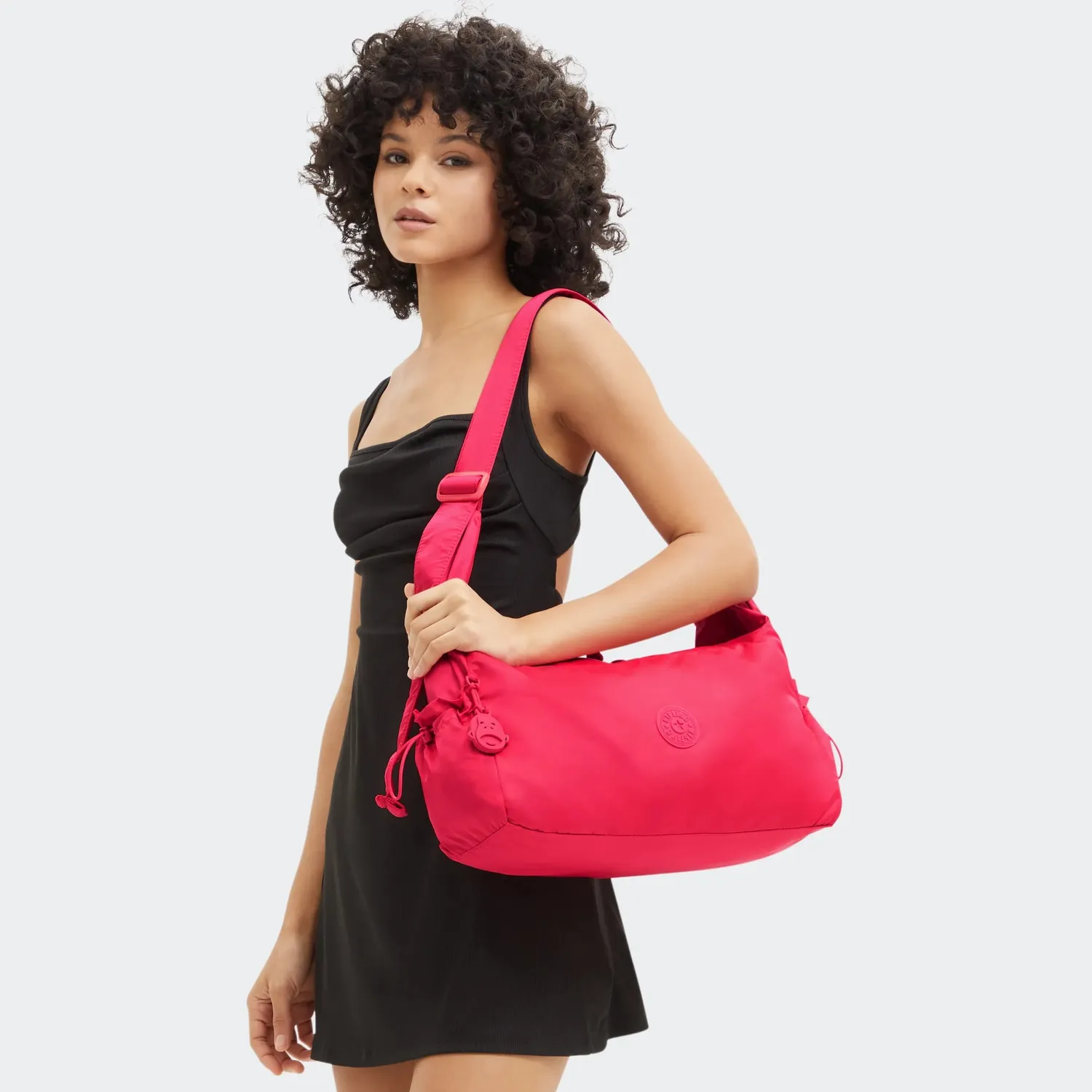 Kipling Gwyn schoudertas groot Simply Fuchsia flessen