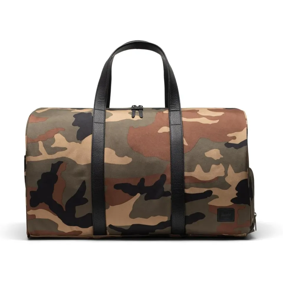 Herschel Novel duffel Woodland Camo canvas reistas