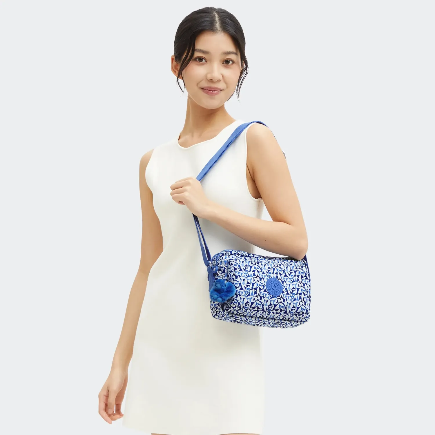 Kipling Abanu M crossbody tas Crazy Leaves medium met ritsvakken