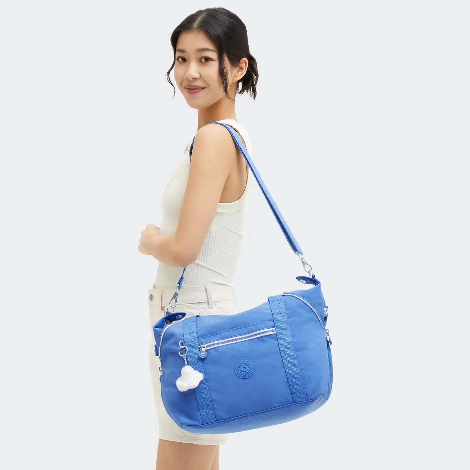 Kipling Art schoudertas medium cocktail blue licht