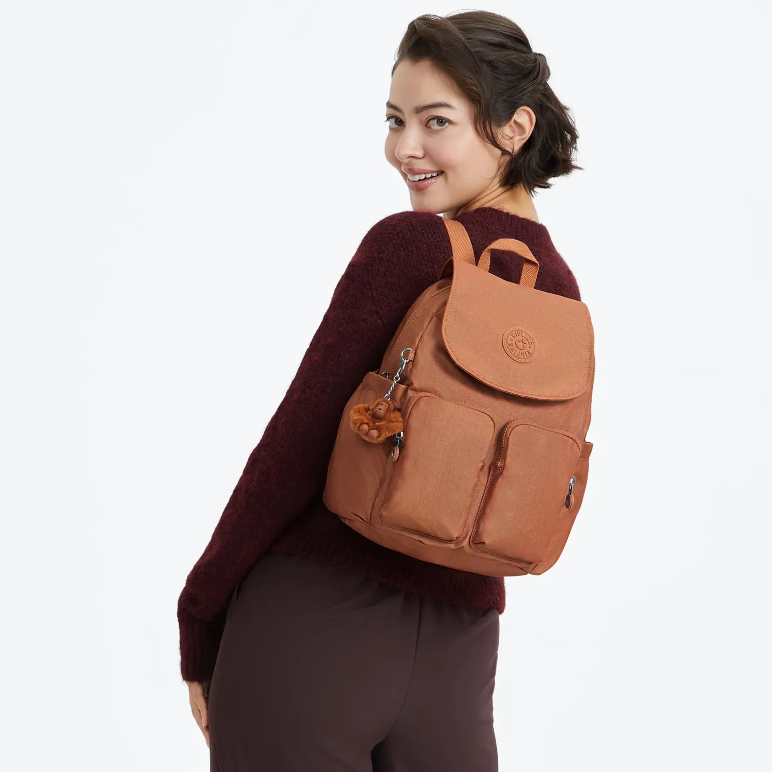 Kipling City Pocket S rugzak Copper Glimmer klein klep