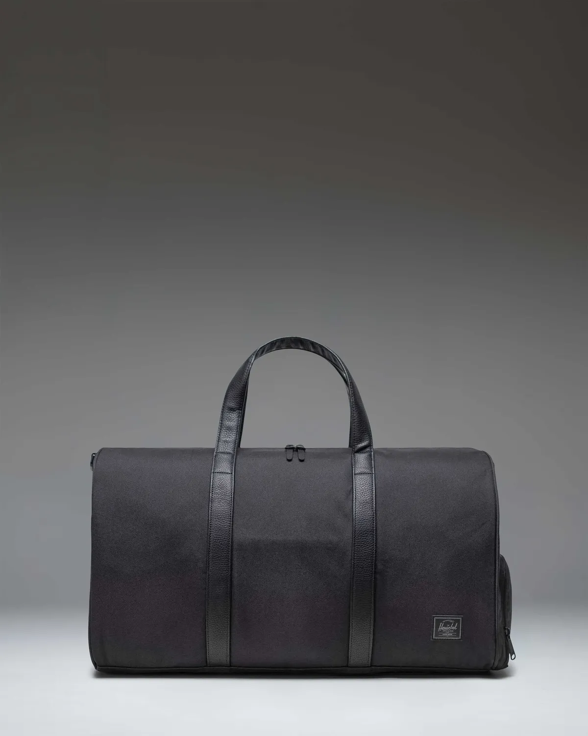 Herschel Novel reistas raven crosshatch handbagage