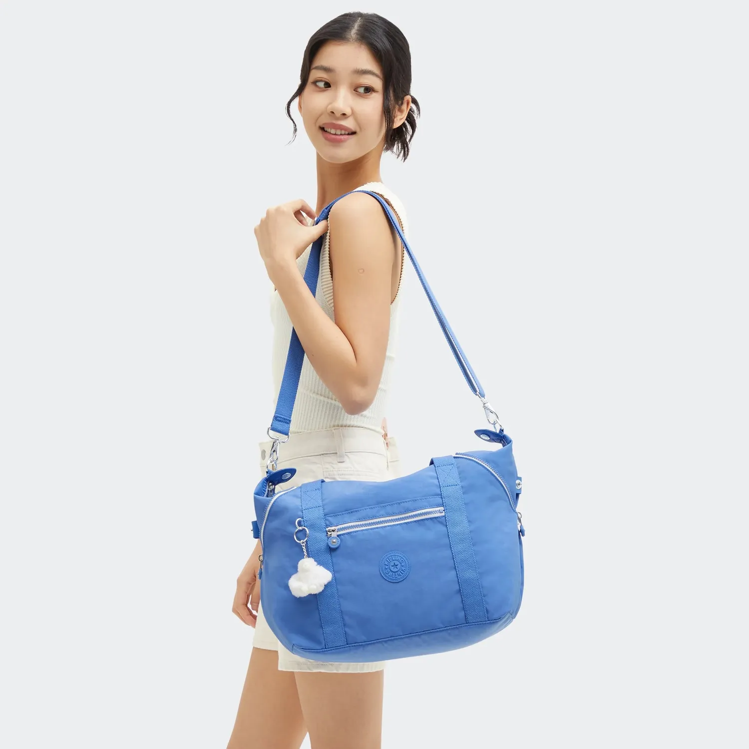 Kipling Art schoudertas medium cocktail blue licht