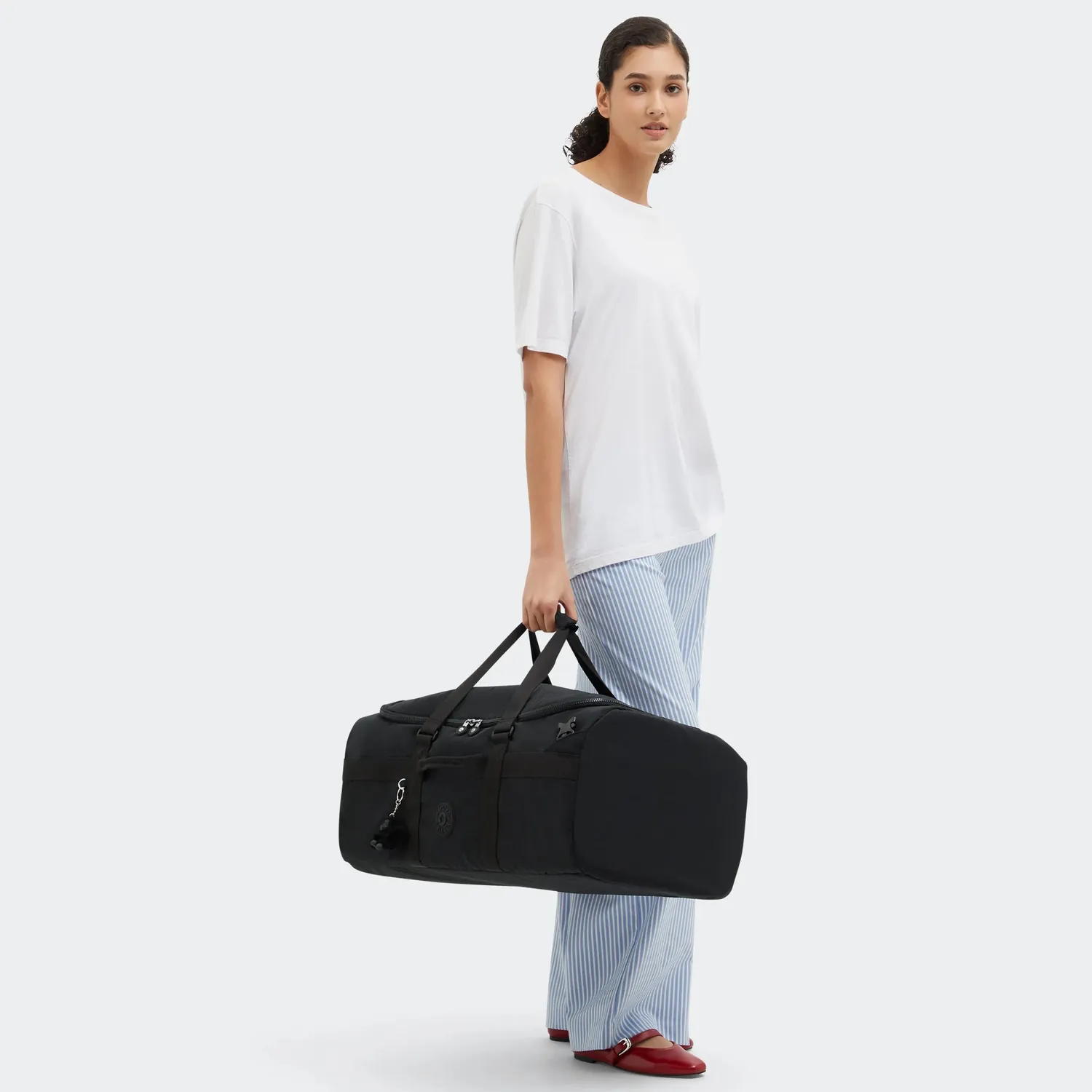 Kipling Jonis M Up reistas Medium Black Noir laptopvak
